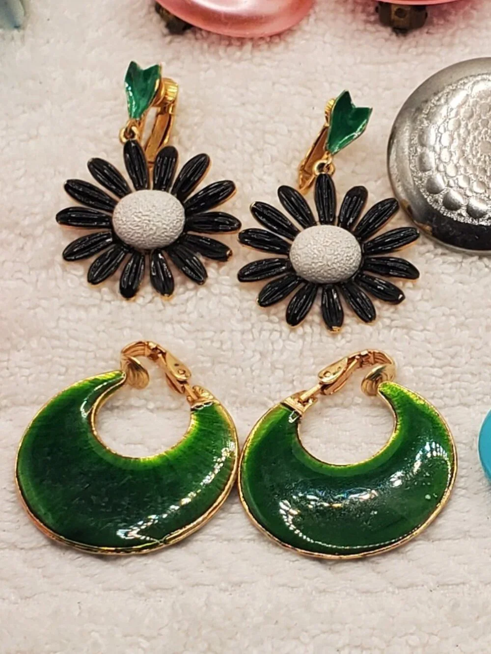 12 Pair of clip on earrings, items # B-2106-2117,.  wt. 123 grams.